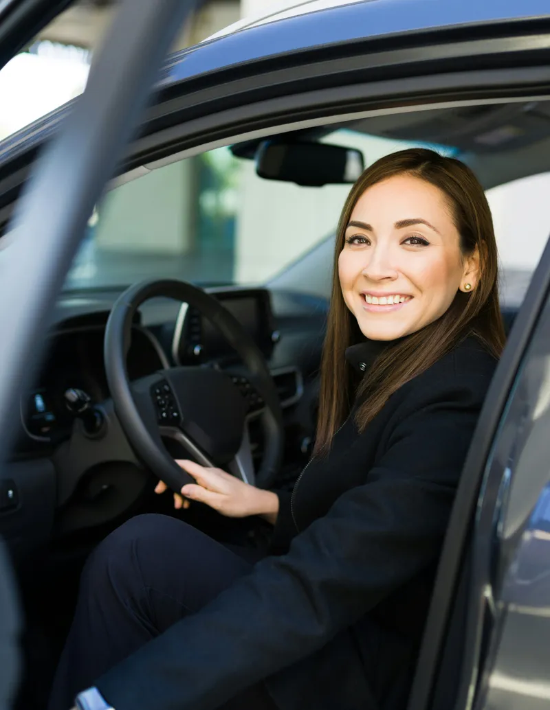 Woman sitting in car